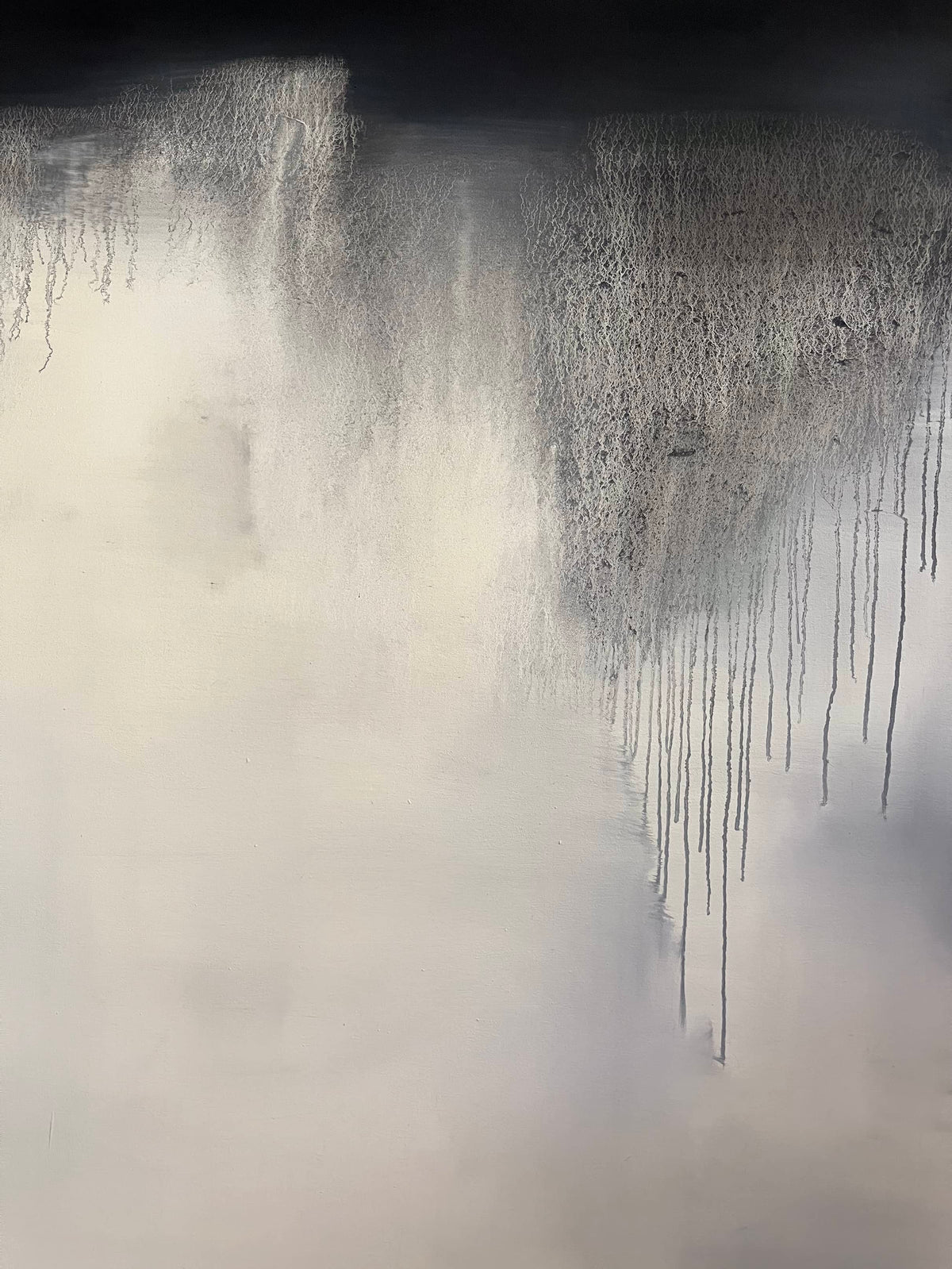 Detail of Abstract Black and White Oil Painting #13 by Laurie Rubell showing layered black, white and grey brushwork and texture.